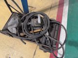 a box with a bunch of wires on the ground