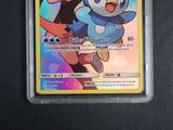 an image of a pokemon card with a picture of a girl