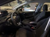 a car that is sitting in a showroom with a steering wheel