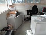 a room with a desk and a chair in it