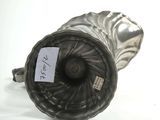 a silver vase that has a tag on it