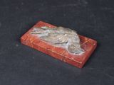 an image of a small red box with a bird on it