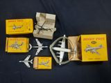 a group of toy airplanes that are sitting on a table