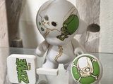 a small toy that is sitting on a glass table