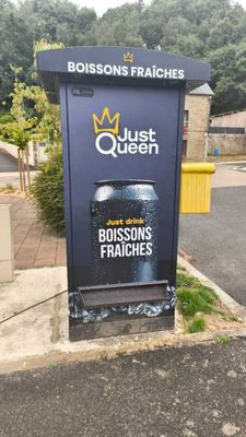 a sign for a restaurant on the side of the street