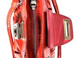 an image of a red purse on a white background
