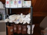 a shelf with a lot of items on it in a room