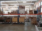a large warehouse with a lot of boxes on the shelves
