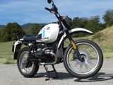 a motorcycle that is parked on the side of the road