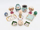 a lot of small vases that are sitting on a table