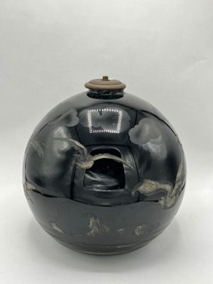 an image of a black vase on a white background