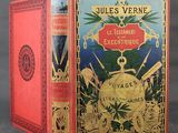 a red book with a gold cover on it