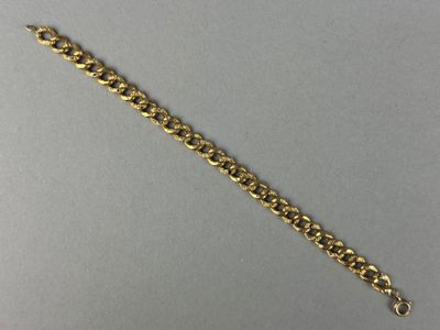 BRACELET en or jaune 750°/°° (18K) maille gourmette. - Photo 1