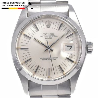 an image of a rolex stainless steel watch with a white dial