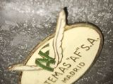 a close up of a metal object with a sticker on it