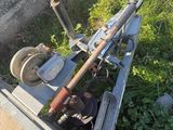 a small machine that is sitting in the grass