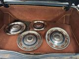 a trunk of a car with four wheels in it