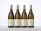three bottles of wine sitting on top of a table