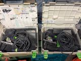 two boxes with wires in them sitting on the floor