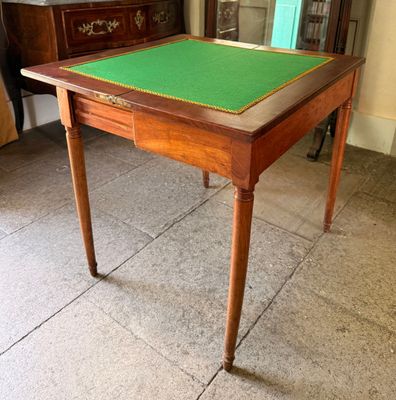 a small table with a green mat on top of it