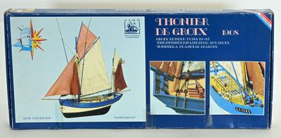a box with a model of a boat in it