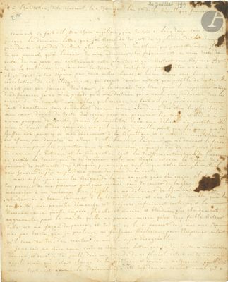 un gros plan d'un morceau de papier sur lequel on a écrit