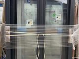 a large glass door that is on a pallet