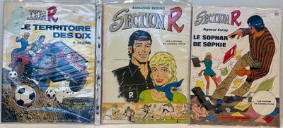 trois livres posés ensemble sur la table