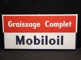 un panneau rouge et blanc sur lequel on peut lire « grassage complete mobioli »
