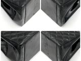 four different views of a black leather ottoman with four different angles