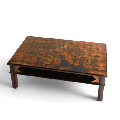 a coffee table with a bird design on it