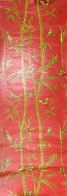 a picture of a red and gold wallpaper with a bamboo tree on it
