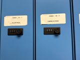 three blue lockers with labels on each side of them