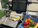 an image of a cash register in a grocery store