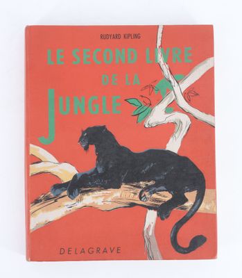un vieux livre pour enfants sur lequel figure un chat noir perché sur une branche d'arbre
