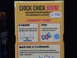a sign on a shelf that says chick chick boom