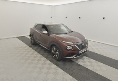 a car that is parked in a room with a checkered floor