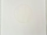 a white piece of paper with a circle cut out of it