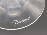 a close up of a wine glass with the word peacecraft written on it