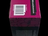 a pink box that is sitting on a black surface