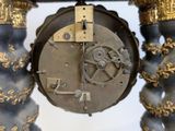 a clock that is sitting on top of a table