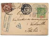 une vieille carte postale sur laquelle sont collés de nombreux timbres
