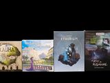 several books are lined up in a row on a black background