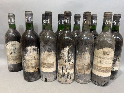 six bottles of wine are lined up in a row on a table
