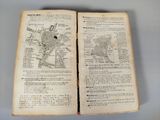 an open book with a map of a city on it