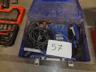 une boîte à outils bleue contenant plusieurs outils
