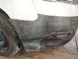 a close up of a car that has been painted black