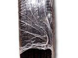 a piece of plastic wrapped around a tire tire