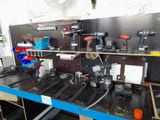 a picture of a workbench with many tools on it