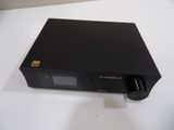 an image of a black cd player sitting on top of a white table